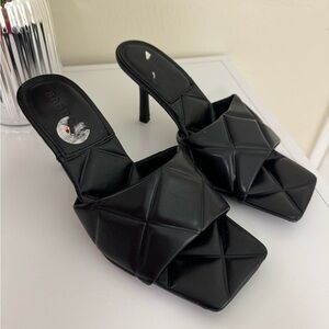 Black Sandal size 7. Heel 3 inches.